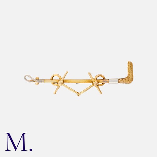 64 - A Set of Gold Brooches, one a walking stick in 9ct yellow gold, one a riding crop and horse bits in ... 