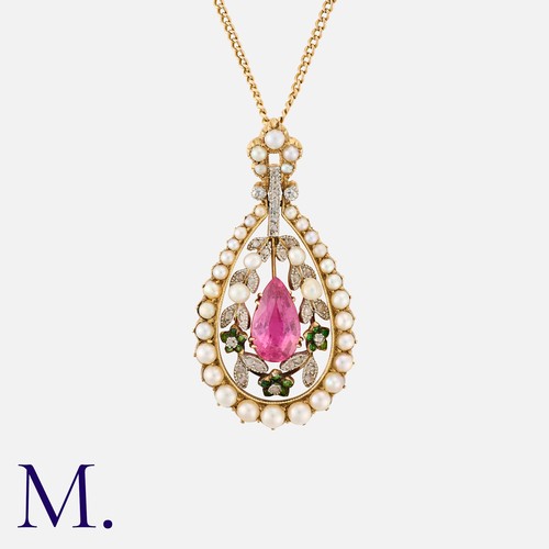 26 - An Antique Pink Tourmaline, Pearl, Diamond and Demantoid Garnet Pendant Necklace in yellow gold, com... 