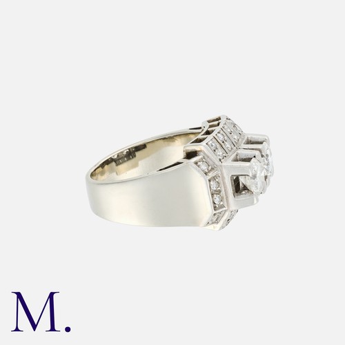 32 - A French Diamond Ring in 18k white gold, set with two principal transitional cut diamonds each weigh... 