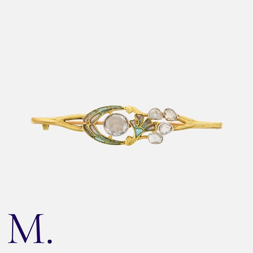 90 - An Art Nouveau Diamond & Enamel Brooch in 18ct yellow gold, set with a larger rose cut diamond to th... 