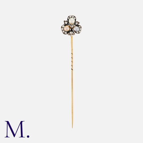 53 - An Antique Pearl And Diamond Stick Pin in yellow gold and silver, the terminal designed as a clover ... 