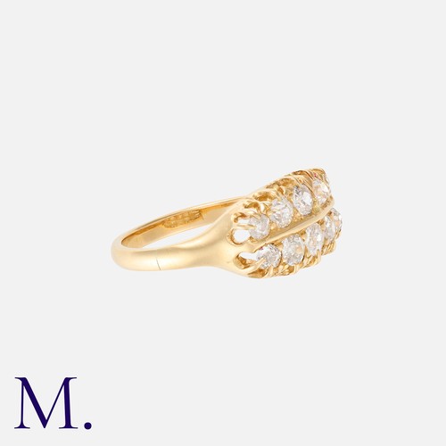 13 - An Old Cut Diamond Ring in yellow gold, comprising two rows of graduated old cut diamonds totalling ... 