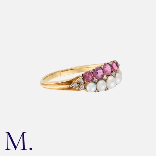 30 - An Antique Ruby, Pearl And Diamond Ring in yellow gold, set with one row of graduated round cut rubi... 