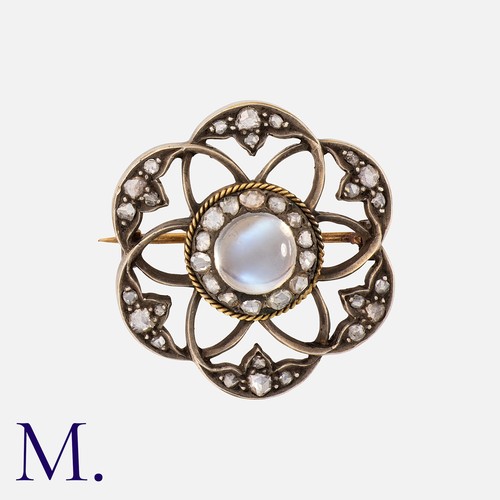 195 - An Antique Moonstone and Diamond Brooch in gold and silver set in the centre with a cabochon moonsto... 