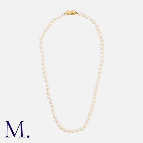 229 - A Pearl Necklace, in 9k yellow gold, comprising a single strand of sixty seven round pearls of appro... 