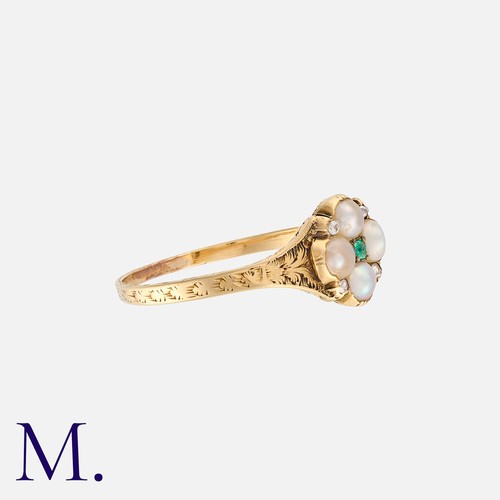 37 - A Victorian Emerald, Pearl And Diamond Ring in yellow gold, comprising a quatrefoil motif of pearls ... 