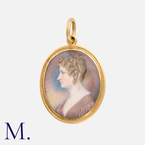 209 - A Georgian Miniature Pendant depicting a female in profile with yellow gold frame. In original leath... 