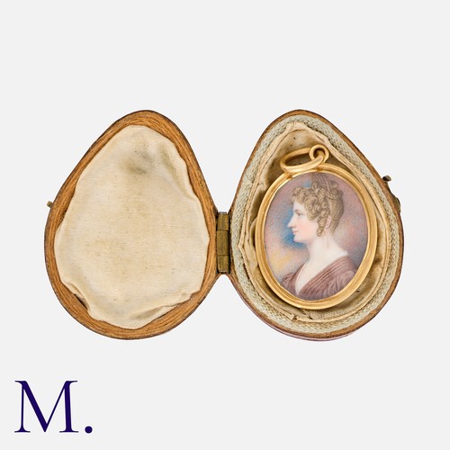 209 - A Georgian Miniature Pendant depicting a female in profile with yellow gold frame. In original leath... 