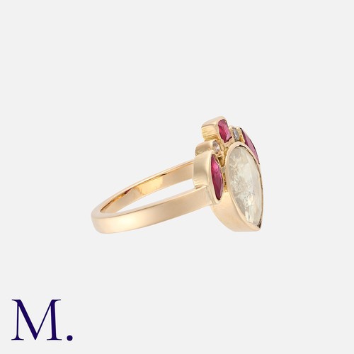 93 - A Rose Diamond and Ruby Ring in yellow gold, set with a large rose diamond to the centre with ruby a... 