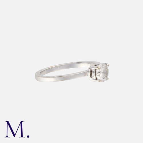 215 - A Diamond Solitaire Ring in white gold, set with a round brilliant diamond weighing approximately 0.... 