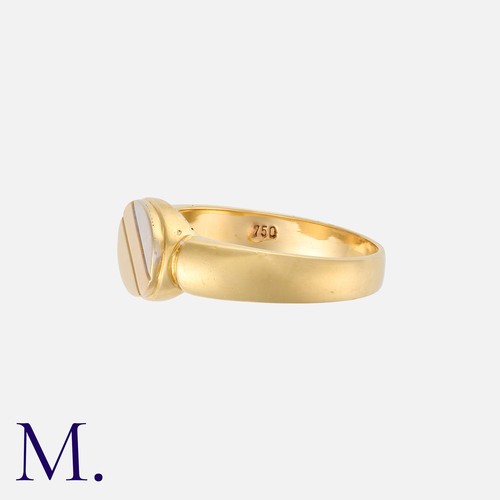 22 - A Gold Signet Ring in 18K yellow with a white and rose gold chevron.  Stamped 750 for 18ct gold.

Si... 