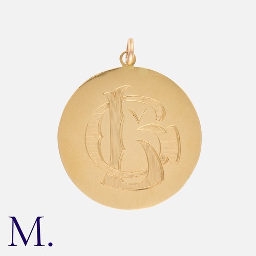 55 - An Antique Engraved Pendant in yellow gold, with monograms either side.

Size: 2.5cm
Weight: 3.2g