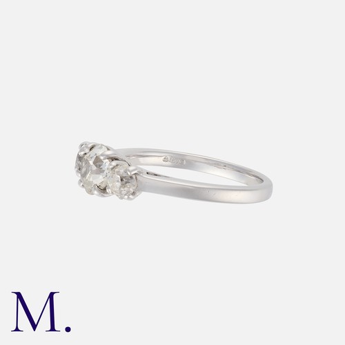 206 - An Old Cut Diamond Three Stone Ring in 18k white gold, set with three old cut diamonds totalling app... 