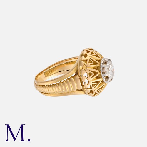 222 - A Retro Diamond Ring in yellow gold, of geometric design, set with a round cut diamond off approxima... 