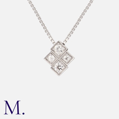 75 - A Diamond Pendant Necklace in18k white gold, the geometric form set with four round cut diamonds tot... 