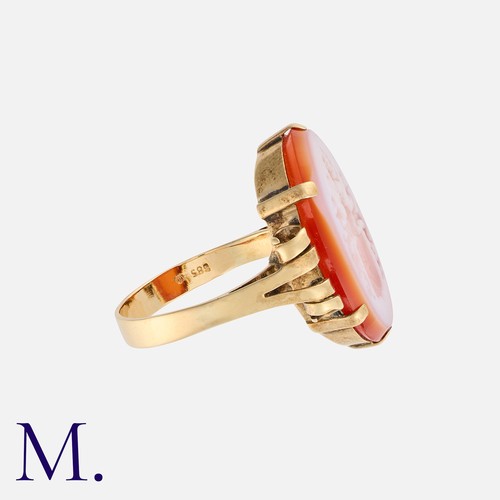 7 - An Intaglio Signet Ring in yellow gold set with an oval carved intaglio carnelian with armorial cres... 