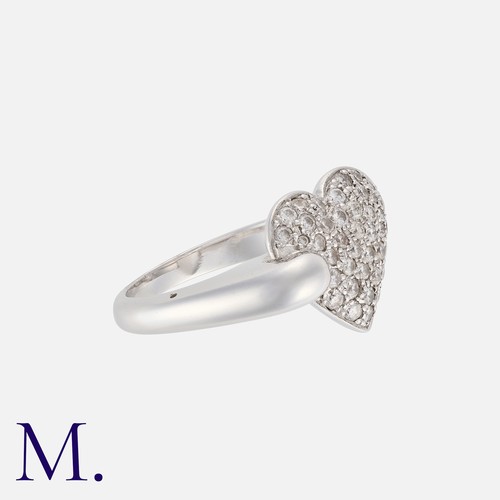 74 - A Diamond Ring in 18 white gold, designed as a heart, pave set with round cut diamonds. French assay... 