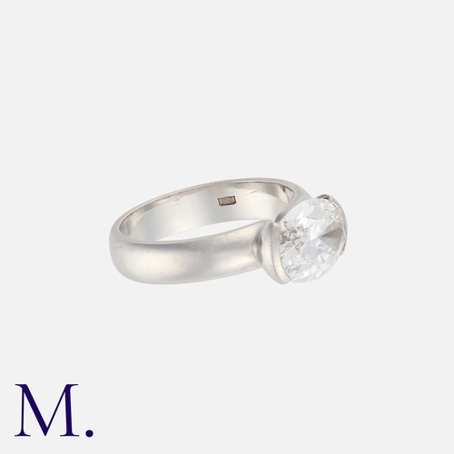 73 - A Diamond Ring in platinum, set with an oval-cut diamond weighing 2.07ct accompanied by a copy of a ... 