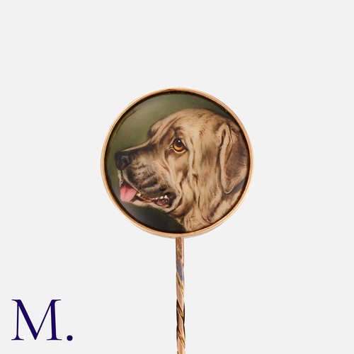 125 - A Victorian Enamel Stick Pin in yellow gold, the terminal an enamelled miniature depicting a mastiff... 