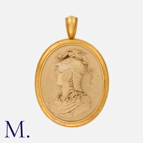 181 - A Victorian Lava Cameo Pendant in yellow gold, the carved lava cameo depicting a soldier with a drag... 