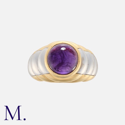 105 - MAUBOUSSIN, An Amethyst Ring in 18k yellow and white gold, the fluted, stepped design in bi colour g... 