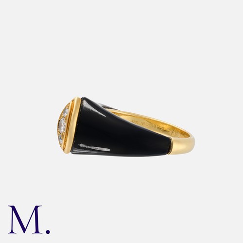 182 - MAUBOUSSIN An Onyx And Diamond Ring in 18k yellow gold,  of abstract design, comprising polished ony... 