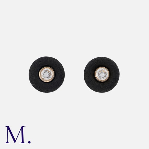 20 - Andre Ribero, A Pair Of Diamond Stud Earrings, in 18k white gold, comprising an outer ring construct... 