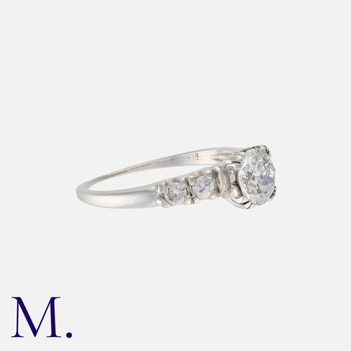 200 - A Diamond Solitaire Ring in platinum set with an old cut diamond accompanied by a laboratory report ... 