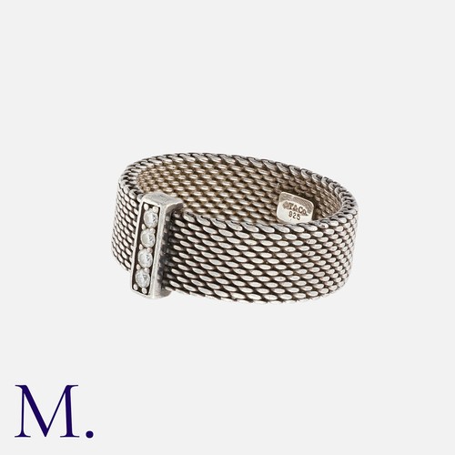 175 - NO RESERVE. TIFFANY & CO. A Diamond Somerset Band in silver, set with four round cut diamonds to a r... 