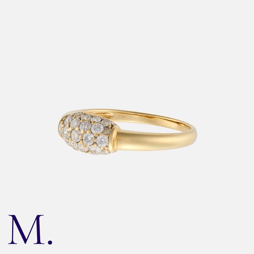 122 - A Diamond Ring in 18k yellow gold, in bombe form set with twenty four round cut diamonds totalling a... 