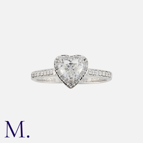 41 - A Diamond Ring in 18k white gold, set with a heart shaped diamond of approximately 0.40cts, within a... 