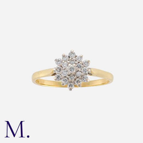 79 - A Vintage Diamond Cluster Ring in 18k yellow gold, comprising a cluster of round cut diamonds totall... 