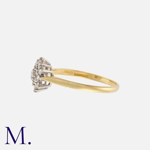 79 - A Vintage Diamond Cluster Ring in 18k yellow gold, comprising a cluster of round cut diamonds totall... 