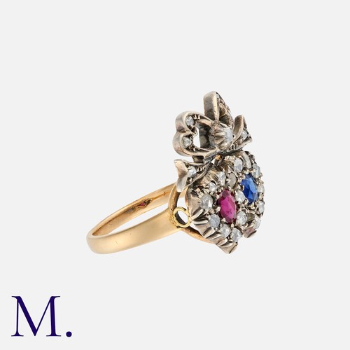 159 - A Victorian Ruby, Sapphire And Diamond Sweetheart Ring in yellow gold and silver, comprising two hea... 