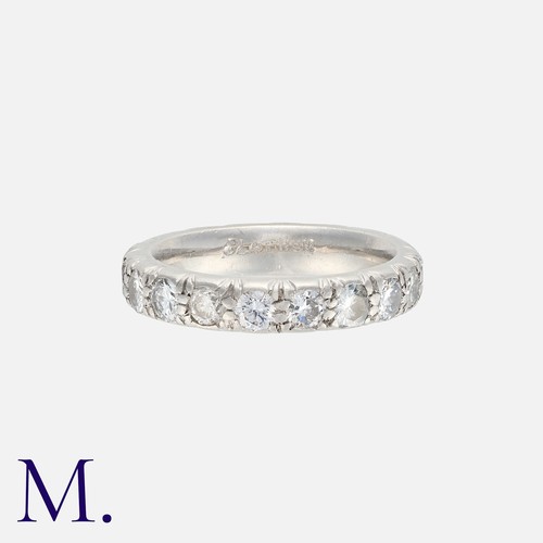 81 - A Diamond Eternity Ring in platinum, set all around with round cut diamonds totalling approximately ... 