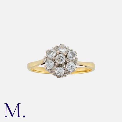 4 - A Diamond Cluster Ring in 18k yellow gold, comprising a cluster of round cut diamonds totalling appr... 