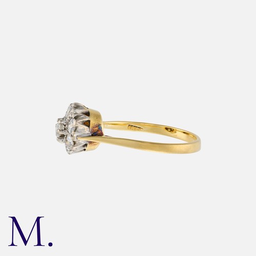 4 - A Diamond Cluster Ring in 18k yellow gold, comprising a cluster of round cut diamonds totalling appr... 