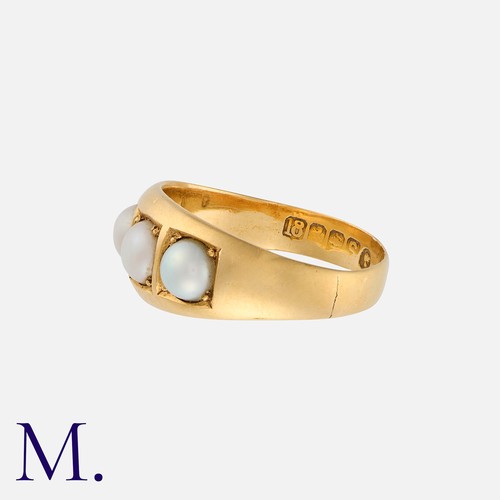 83 - A Pearl Gypsy Ring in 18k yellow gold, set with four round pearls. Partial hallmarks for 18 carat go... 