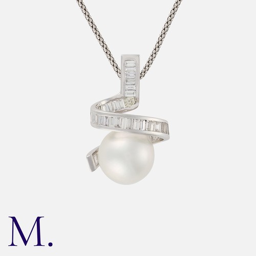 26 - A Pearl And Diamond Pendant Necklace in 18k white gold, designed as a round pearl of approximately 1... 