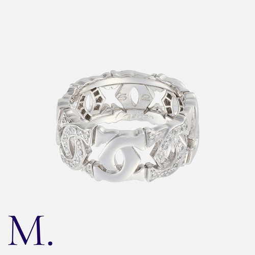 11 - CARTIER , A Diamond Set Double C Logo Ring in 18k white gold, comprising a series of interlocking C ... 