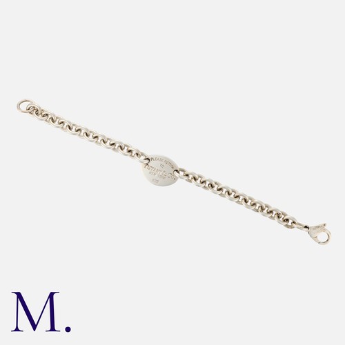 27 - Tiffany & Co, A 'Return To Tiffany' Bracelet in silver comprising a series of interlocking links, th... 