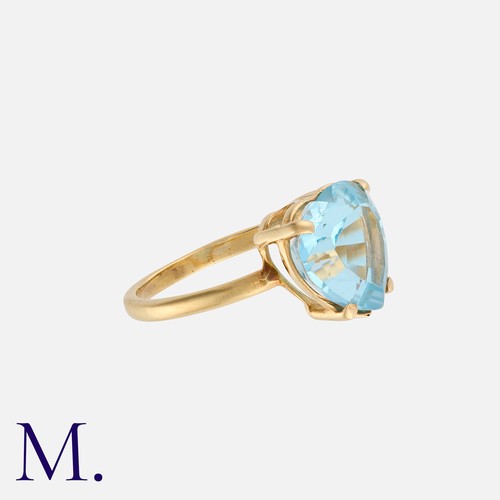 195 - NO RESERVE. A Blue Gemstone Heart Ring in yellow gold, set with a heart-shaped blue gemstone.  Band ... 