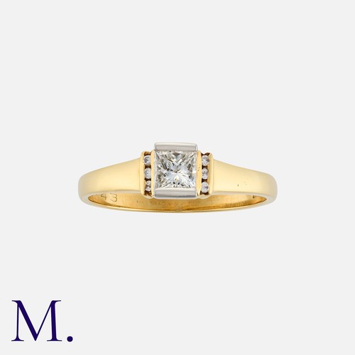 95 - A Diamond Solitaire Ring in 18K yellow and white gold, set with a princess cut diamond weighing 0.43... 