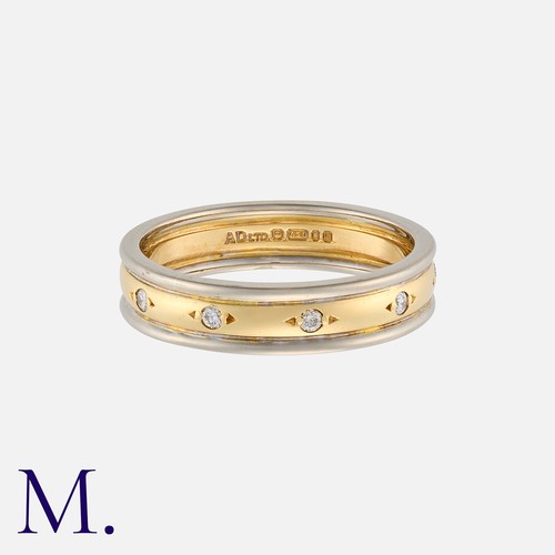 146 - A Diamond Band in 18K yellow and white gold, set with round cut diamonds weighing approx. 0.15ct at ... 