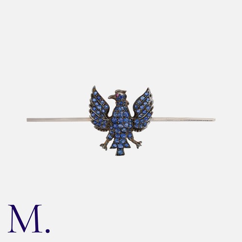 215 - An Antique Sapphire And Ruby Eagle Brooch in yellow gold, platinum and silver. Comprising an eagle w... 