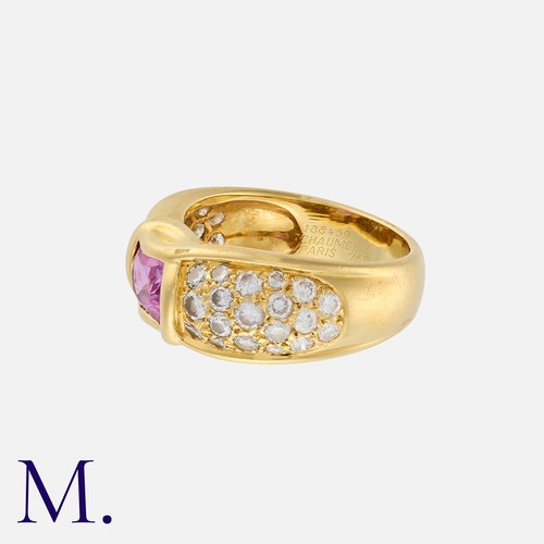 48 - CHAUMET. A Pink Sapphire and Diamond Ring in 18K yellow gold, set with a cushion cut pink sapphire t... 