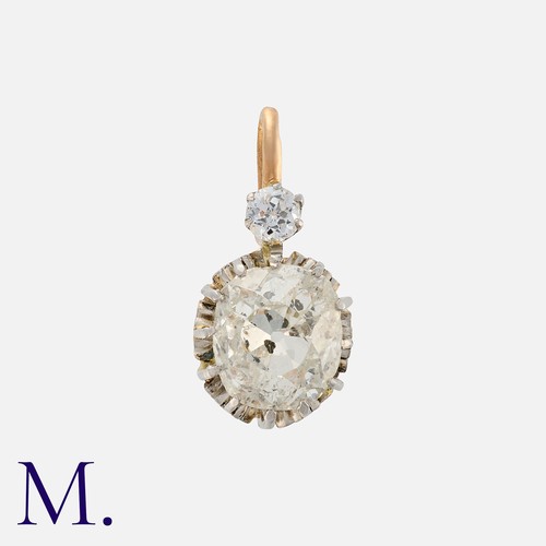 93 - An Old Cut Diamond Pendant in 18K yellow gold, set with an old cut diamond weighing approx. 1.40ct w... 