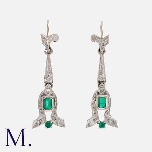 31 - A Pair Of Emerald And Diamond Earrings in white gold, the articulated drops set with rose cut diamon... 