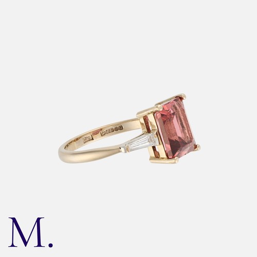 163 - A Tourmaline and Diamond Ring in 18K white gold, set with an emerald cut tourmaline (measuring appro... 