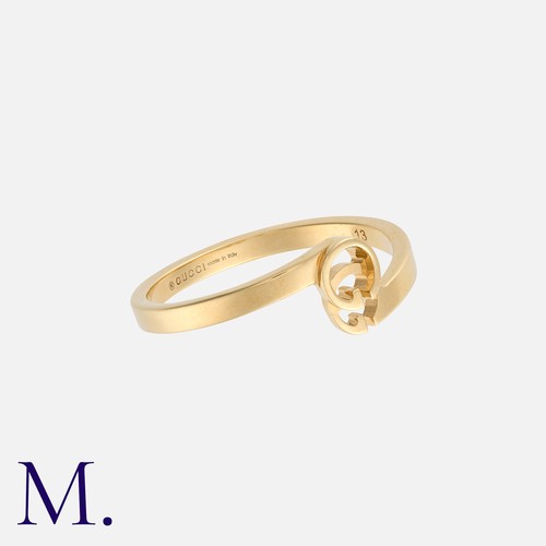 172 - GUCCI. A Logo Ring in 18K yellow gold with the Gucci logo to the centre.  Signed Gucci with Italian ... 